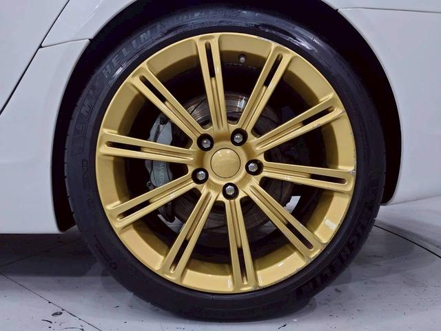 ラピード ベースグレード　ユーザー様直接仕入れ　Ｖ１２エンジン　純正２０インチゴールド塗装ＡＷ　純正ナビ　バックモニター　茶レザーシート　パワーシート　シートヒーター　タッチトロニック　Ｂａｎｇ＆Ｏｌｆｓｅｎスピーカー　ＥＴＣ（66枚目）