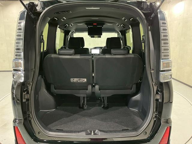 ヴォクシー ＺＳ　煌ＩＩ　ワンオーナー　ＴＲＤエアロ　１６インチＡＷ　両側パワスラ　ＬＥＤヘッドライト　純正ナビ　フルセグＴＶ　Ｂｌｕｅｔｏｏｔｈ接続　リアカメラ　フリップダウン　オートクルーズ　ドラレコ　スマートキー　ＥＴＣ（65枚目）