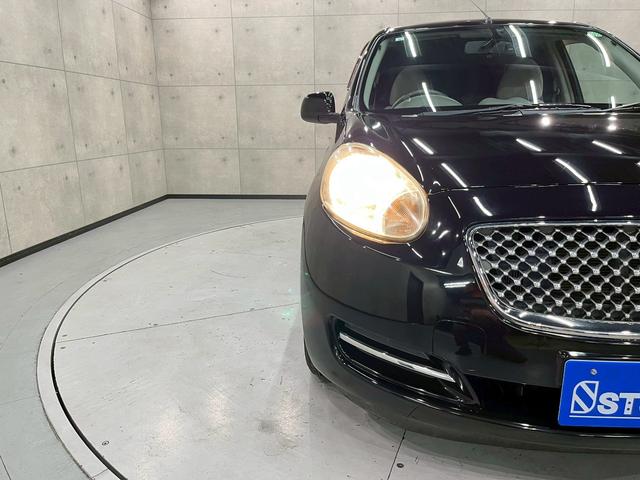 マーチ ボレロ　ユーザー様直接仕入れ車両　専用エクステリア・１４インチアルミ　純正ナビ　フルセグＴＶ　Ｂｌｕｅｔｏｏｔｈ　バックモニター　ドラレコ　メッキドアハンドル　革巻きステア　インテリジェントキー　ＥＴＣ車載器（9枚目）