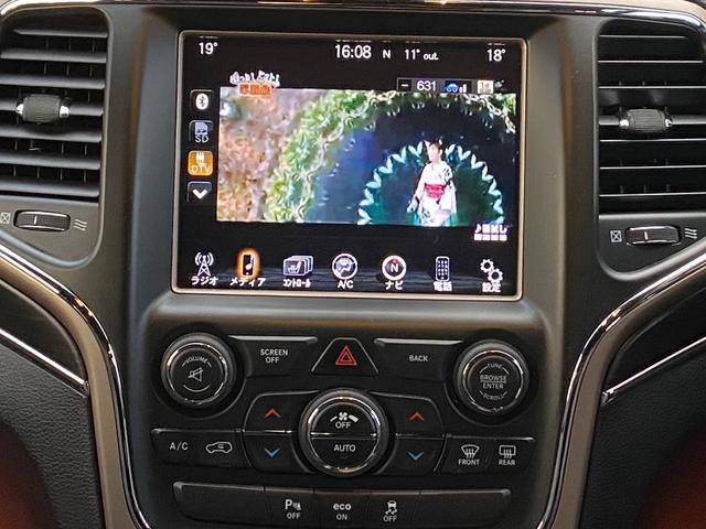 ジープ・グランドチェロキー リミテッド　ナビ　ＣＤ　４ＷＤ　盗難防止システム　ＡＢＳ　運転席エアバッグ　助手席エアバッグ　サイドエアバッグ　パワーシート　エアコン　パワーステアリング　パワーウィンドウ　ＨＩＤ　オートクルーズコントロール（21枚目）