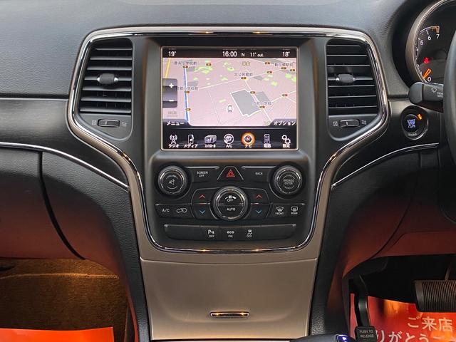ジープ・グランドチェロキー リミテッド　ナビ　ＣＤ　４ＷＤ　盗難防止システム　ＡＢＳ　運転席エアバッグ　助手席エアバッグ　サイドエアバッグ　パワーシート　エアコン　パワーステアリング　パワーウィンドウ　ＨＩＤ　オートクルーズコントロール（56枚目）