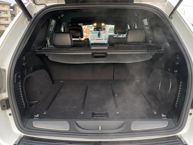 ジープ・グランドチェロキー リミテッド　ナビ　ＣＤ　４ＷＤ　盗難防止システム　ＡＢＳ　運転席エアバッグ　助手席エアバッグ　サイドエアバッグ　パワーシート　エアコン　パワーステアリング　パワーウィンドウ　ＨＩＤ　オートクルーズコントロール（62枚目）