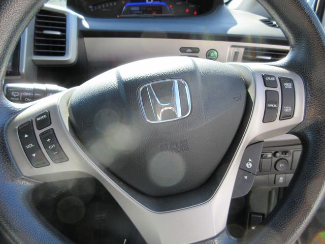 フリードハイブリッド ジャストセレクション　外アルミホイール　フリップダウンモニター　９インチナビ　スマートキー２個　バックカメラ　片側電動パワースライドドア　ＨＩＤヘッドライト　クルーズコントロール　アイドリングストップ　ＡＢＳ（37枚目）