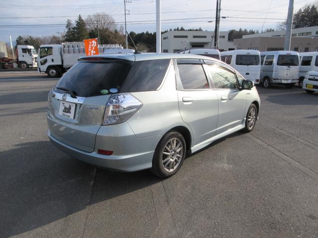 フィットシャトルハイブリッド ハイブリッド・スマートセレクション　社外アルミホイール　スマートキー　ＥＴＣ　ナビ　バックカメラ　ｂｌｕｅｔｏｏｔｈ　クルーズコントロール　ＨＩＤヘッドライト　フロントフォグランプ　ＡＢＳ　頸部衝突緩和ヘッドレスト（11枚目）