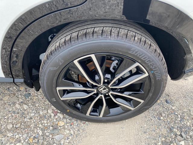 ヴェゼル ｅ：ＨＥＶ　Ｚ　ｅＨＥＶ　Ｚ　ＨｏｎｄａＳｅｎｓｉｎｇＢＳＭ　ＲａｄａｒＣｒｕｉｓｅ　Ｐｏｗｅｒ　ＬｉｆｔＧａｔｅＨａｌｆ　ＬｅａｔｈｅｒＳｅａｔｓ　ＣｏｒｎｅｒＳｅｎｓｏｒ　ＳｍａｒｔＫｅｙＬＥＤＨｅａｄｌｉｇｈｔ（24枚目）