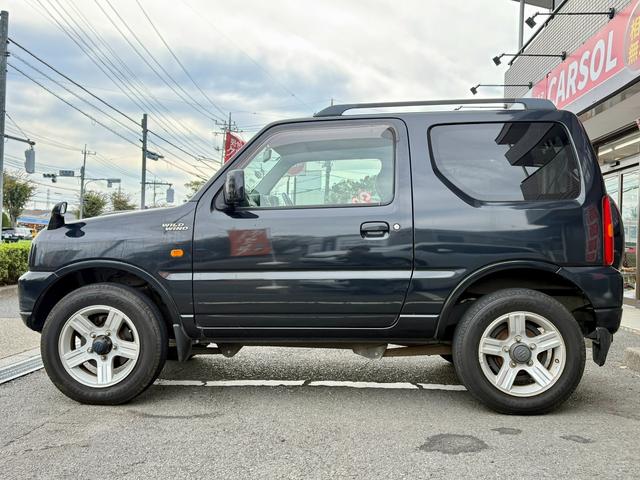 ジムニー ワイルドウインド　法定整備付　ワンオーナー　切り替え４ＷＤ　運転席側シートヒーター　Ｗエアバック　ＡＢＳ付き　パワーウインドウ　ターボ付　エアコンパワステ　キーレスエントリー　衝突安全ボディ　ＥＴＣ（2枚目）
