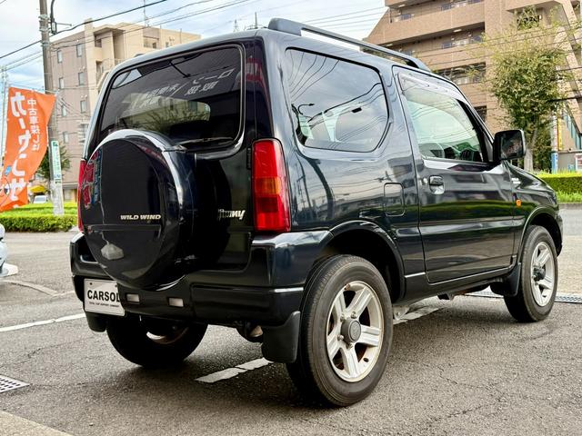 ジムニー ワイルドウインド　法定整備付　ワンオーナー　切り替え４ＷＤ　運転席側シートヒーター　Ｗエアバック　ＡＢＳ付き　パワーウインドウ　ターボ付　エアコンパワステ　キーレスエントリー　衝突安全ボディ　ＥＴＣ（3枚目）