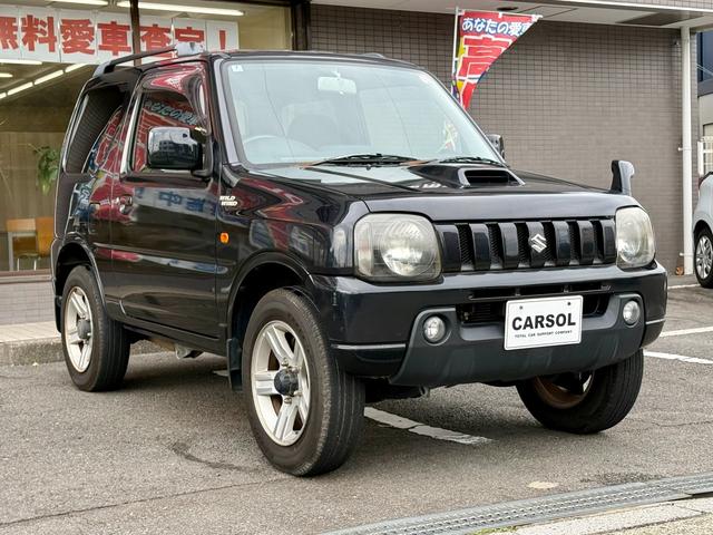 ジムニー ワイルドウインド　法定整備付　ワンオーナー　切り替え４ＷＤ　運転席側シートヒーター　Ｗエアバック　ＡＢＳ付き　パワーウインドウ　ターボ付　エアコンパワステ　キーレスエントリー　衝突安全ボディ　ＥＴＣ（10枚目）