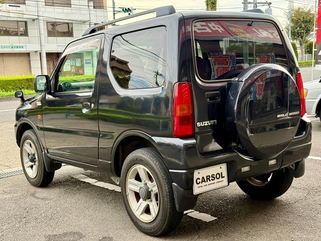 ジムニー ワイルドウインド　法定整備付　ワンオーナー　切り替え４ＷＤ　運転席側シートヒーター　Ｗエアバック　ＡＢＳ付き　パワーウインドウ　ターボ付　エアコンパワステ　キーレスエントリー　衝突安全ボディ　ＥＴＣ（14枚目）