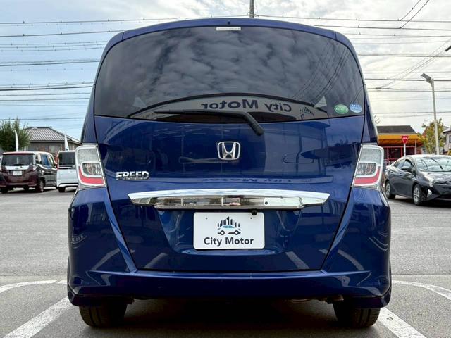 フリード GH 電動スライドドア ナビ TV ETC バックモニター ヘッドライトHID オートライト スマートキー オートエアコン 電動格納ミラー サイドバイザー パワーウィンドウ VSA 純正ホイールキャップ(3枚目)