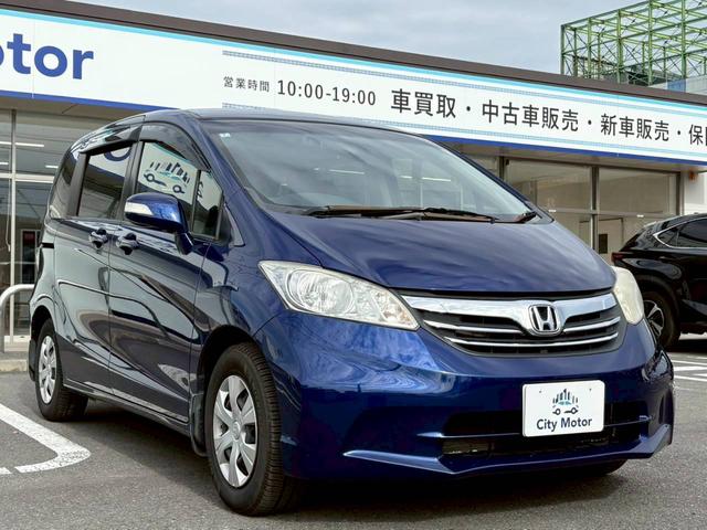 フリード GH 電動スライドドア ナビ TV ETC バックモニター ヘッドライトHID オートライト スマートキー オートエアコン 電動格納ミラー サイドバイザー パワーウィンドウ VSA 純正ホイールキャップ(6枚目)