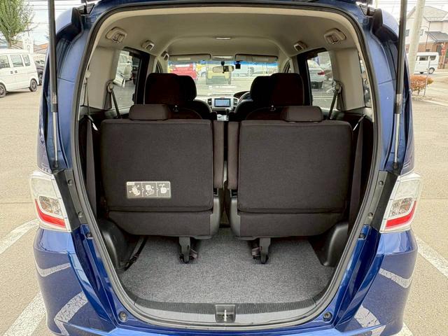 フリード GH 電動スライドドア ナビ TV ETC バックモニター ヘッドライトHID オートライト スマートキー オートエアコン 電動格納ミラー サイドバイザー パワーウィンドウ VSA 純正ホイールキャップ(16枚目)