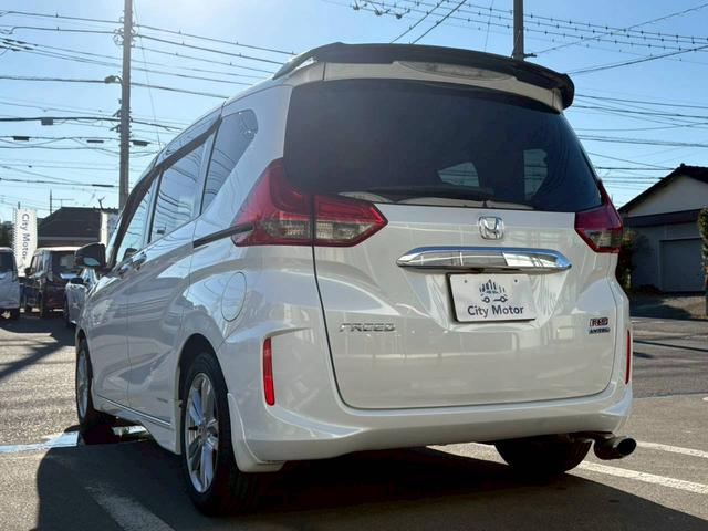 フリード Ｇ・ホンダセンシング　無限エアロ・両側電動スライドドア・純正ナビ・バックカメラ・フルセグＴＶ・ワンオーナー・ホンダセンシング・デジタルメーター・クルーズコントロール・ＬＥＤヘッドライト・純正アルミ・プッシュスタート・ＥＴＣ（9枚目）