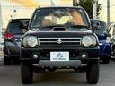 ジムニー ワイルドウインド 4WD・MT車・ルーフレール・フロントフォグランプ・電動格納ミラー・革巻きステアリング・SRSエアバック(運転席/助手席)・シートヒーター・社外アルミ・ABS・社外オーディオ・車検:令和9年8月! 中古車画像_2