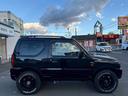 ジムニー ワイルドウインド 4WD・MT車・ルーフレール・フロントフォグランプ・電動格納ミラー・革巻きステアリング・SRSエアバック(運転席/助手席)・シートヒーター・社外アルミ・ABS・社外オーディオ・車検:令和9年8月! 中古車画像_4