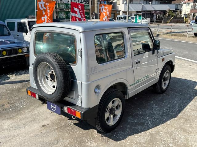 ジムニー ワイルドウインド　５ＭＴ　１ＤＩＮオーディオ　インタークーラーターボ　アルミホイール　フロントフォグランプ　エアコン　パワーステアリング（13枚目）