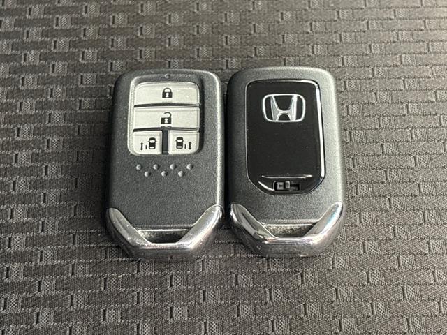 ステップワゴンスパーダ スパーダホンダセンシング　ワンオーナー　点検パック当社実施済み　４ＷＤ　純正１０インチナビ　ミュージックサーバー　Ｂｌｕｅｔｏｏｔｈ　ＵＳＢ　フルセグ　リアカメラ　ＥＴＣ２．０　純正前後ドラレコ　両側電動ドア　ＬＥＤ　ナビＴＶ（26枚目）