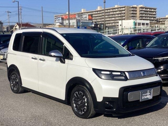 フリード ｅ：ＨＥＶクロスター　禁煙車　元当社試乗車　純正１１．４インチナビ　ミュージックサーバー　Ｂｌｕｅｔｏｏｔｈ　ＵＳＢ　フルセグ　リアカメラ　ＥＴＣ　純正ドラレコ　シートヒーター　両側電動ドア　純正１５インチアルミホイール（36枚目）