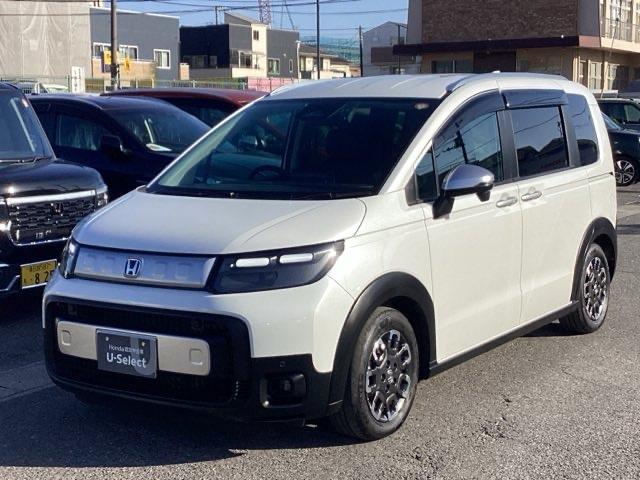 フリード ｅ：ＨＥＶクロスター　禁煙車　元当社試乗車　純正１１．４インチナビ　ミュージックサーバー　Ｂｌｕｅｔｏｏｔｈ　ＵＳＢ　フルセグ　リアカメラ　ＥＴＣ　純正ドラレコ　シートヒーター　両側電動ドア　純正１５インチアルミホイール（38枚目）