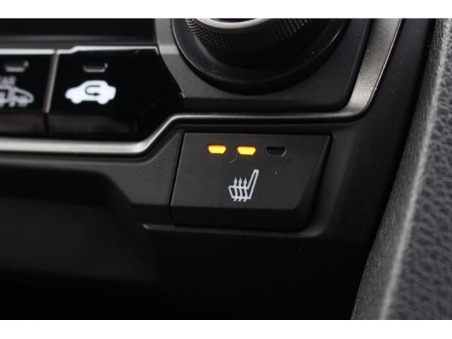 シビック ハッチバック　ホンダセンシング　６ＭＴ　Ｆ．Ｓ．Ｒエアロキット　シートヒーター　純正ナビ　バックカメラ　フルセグＴＶ　デジタルインナーミラー型ドライブレコーダー　レーダークルーズコントロール　レーンキープ　ＥＴＣ（16枚目）
