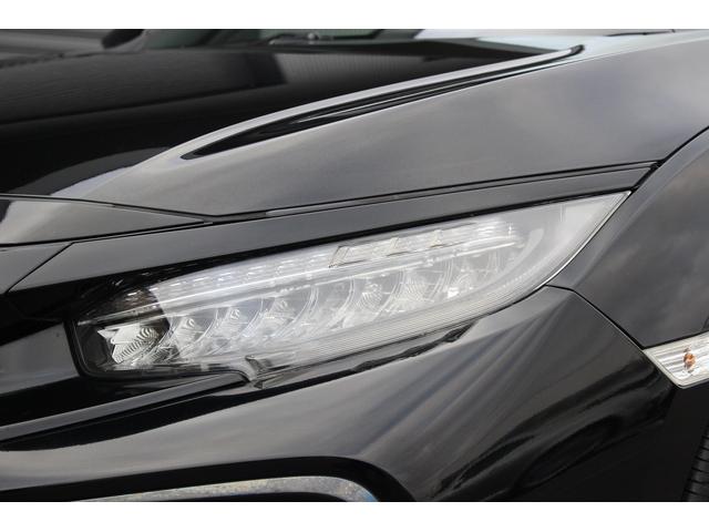 シビック ハッチバック　ホンダセンシング　６ＭＴ　Ｆ．Ｓ．Ｒエアロキット　シートヒーター　純正ナビ　バックカメラ　フルセグＴＶ　デジタルインナーミラー型ドライブレコーダー　レーダークルーズコントロール　レーンキープ　ＥＴＣ（34枚目）