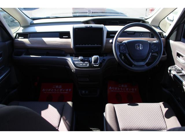 フリードハイブリッド ハイブリッド・Ｇホンダセンシング　全国対応２年保証付　車検整備付　衝突軽減ブレーキ　ナビ　ＴＶ　バックモニター　両側パワースライドドア　スマートキー　Ｂｌｕｅｔｏｏｔｈ接続　アイドリングストップ　ＥＴＣ　横滑り防止付　シートヒーター（2枚目）