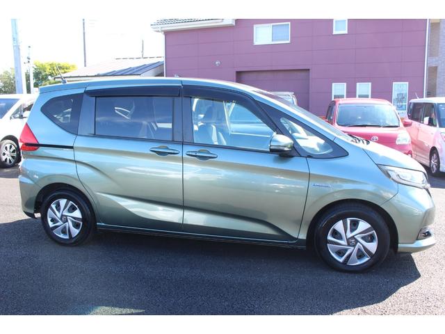 フリードハイブリッド ハイブリッド・Ｇホンダセンシング　全国対応２年保証付　車検整備付　衝突軽減ブレーキ　ナビ　ＴＶ　バックモニター　両側パワースライドドア　スマートキー　Ｂｌｕｅｔｏｏｔｈ接続　アイドリングストップ　ＥＴＣ　横滑り防止付　シートヒーター（18枚目）
