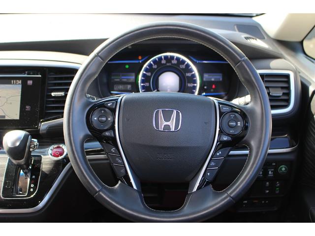 オデッセイハイブリッド ハイブリッドアブソルート・ホンダセンシングEXパック 全国対応2年保証付 車検整備付 衝突軽減ブレーキ ナビTV バックモニター 両側パワースライドドア ハーフレザー オットマン パワーシート Bluetooth 純正アルミホイール ETC スマートキー(10枚目)