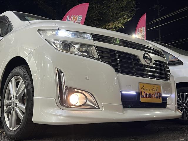 エルグランド 250ハイウェイスター プレミアム保証/純正メーカーオプションナビ/純正メーカーオプションフリップダウンモニター/アラウンドビューカメラ/前後コーナーセンサー/両側パワスラ/デイライト/7人乗りキャプテンシート/AC100V(3枚目)