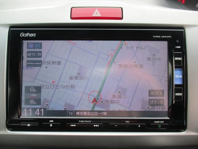 フリード Ｇ　プレミアムエディション　純正ＳＤナビフルセグＴＶ／バックカメラ／後席フリップダウンモニタ－／ＥＴＣ／両側自動ドア／スマートキー／イモビ／オートＡＣ／ＨＩＤライト／ハーフレザーシート／Ｍウィンカー／ＣＤ／ＤＶＤ再生／ＣＤ録音（5枚目）