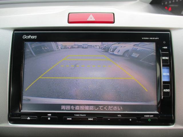 フリード Ｇ　プレミアムエディション　純正ＳＤナビフルセグＴＶ／バックカメラ／後席フリップダウンモニタ－／ＥＴＣ／両側自動ドア／スマートキー／イモビ／オートＡＣ／ＨＩＤライト／ハーフレザーシート／Ｍウィンカー／ＣＤ／ＤＶＤ再生／ＣＤ録音（6枚目）