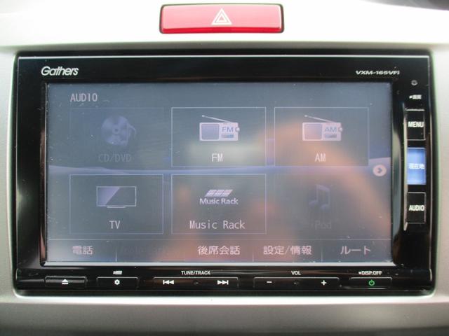 フリード Ｇ　プレミアムエディション　純正ＳＤナビフルセグＴＶ／バックカメラ／後席フリップダウンモニタ－／ＥＴＣ／両側自動ドア／スマートキー／イモビ／オートＡＣ／ＨＩＤライト／ハーフレザーシート／Ｍウィンカー／ＣＤ／ＤＶＤ再生／ＣＤ録音（7枚目）