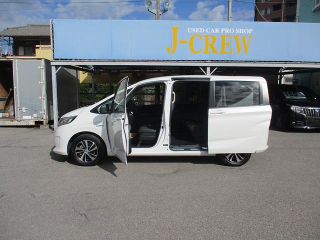 フリードハイブリッド ハイブリッド・Ｇホンダセンシング　ワンオ－ナ－／禁煙車／純正ＴＶ／Ｂカメラ／後席モニタ‐／スマ－トキ‐／イモビ／Ｉ－ｓｔｏｐ／ＥＴＣ／ハ－フレザ－／革巻Ｈ／ＬＥＤ／レーンアシスト／両側自動／ウオークスル‐／純正１５ＡＷ／（12枚目）