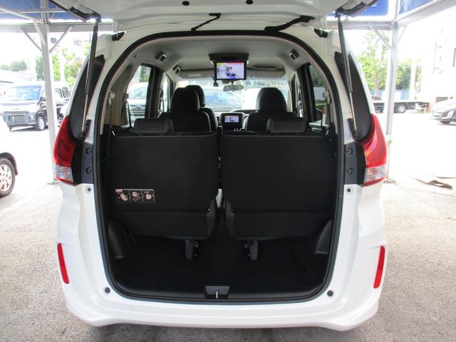 フリードハイブリッド ハイブリッド・Ｇホンダセンシング　ワンオ－ナ－／禁煙車／純正ＴＶ／Ｂカメラ／後席モニタ‐／スマ－トキ‐／イモビ／Ｉ－ｓｔｏｐ／ＥＴＣ／ハ－フレザ－／革巻Ｈ／ＬＥＤ／レーンアシスト／両側自動／ウオークスル‐／純正１５ＡＷ／（61枚目）