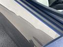 運転席ドアにやや広い範囲の凹みございます 写真は前方より