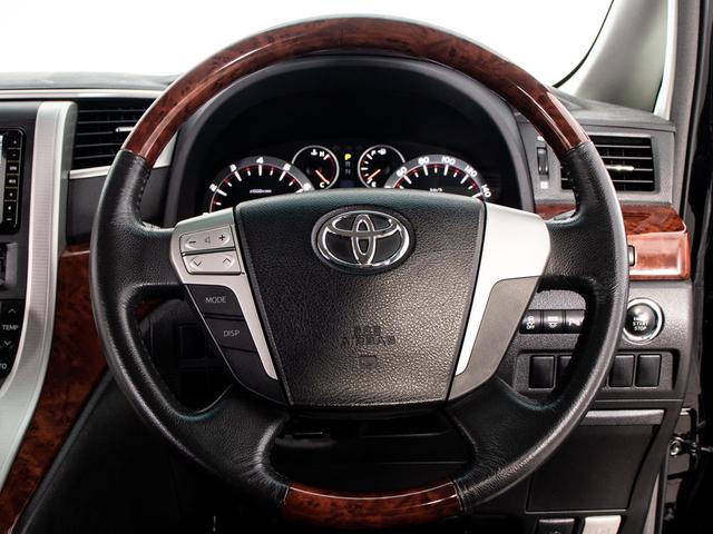 ヴェルファイア 2.4Z プラチナムセレクション (禁煙・ワンオーナー車)(後席モニター)(両側自動ドア)(パワーバックドア)特別仕様車/黒革調シートカバー/バックカメラ/コンビハンドル/クリアランスソナー/Bluetooth接続/ダウンサス/(32枚目)