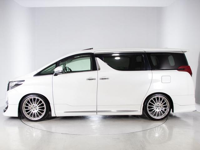 アルファード 2.5S Cパッケージ (禁煙)(カールソン21インチアルミ)(車高調)(モデリスタフルエアロ)サンルーフ/黒本革/JBLサウンド/全方位カメラ/後席モニター/前車追従レーダークルーズ/衝突被害軽減ブレーキ/AC100V電源(16枚目)