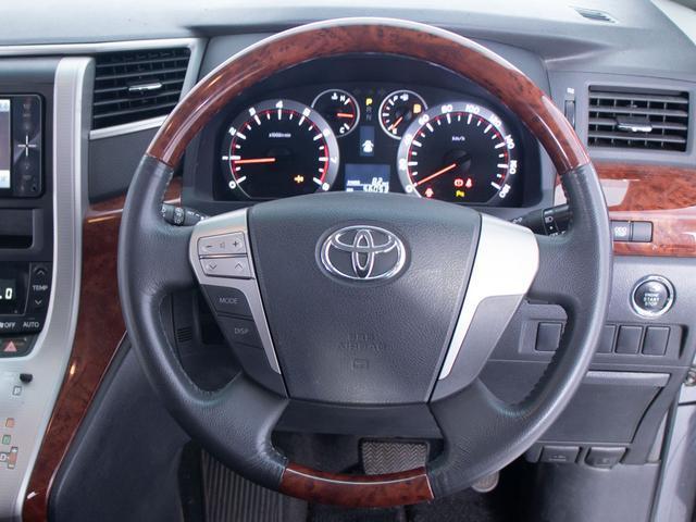 ヴェルファイア 2.4Z プラチナセレクションII (禁煙車)(後席モニター)(両側自動ドア)(パワーバックドア)専用アルカンターラシート/純正SDナビ/バックカメラ/ビルトインETC/クリアランスソナー/コンビハンドル/Bluetooth接続/(34枚目)