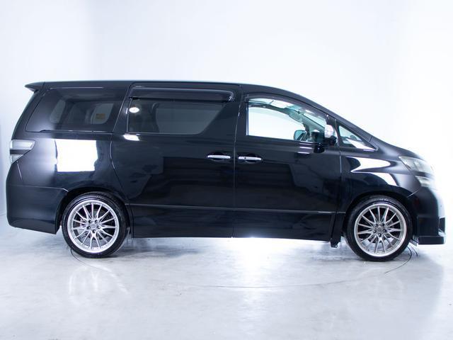 ヴェルファイア 2.4Z プラチナセレクションII タイプゴールド (禁煙車)(フロントリップ)(社外20インチアルミ)(黒革調シートカバー)純正HDDナビ/後席モニター/バックカメラ/両側自動ドア/パワーバックドア/クリアランスソナー/コンビハンドル/(18枚目)