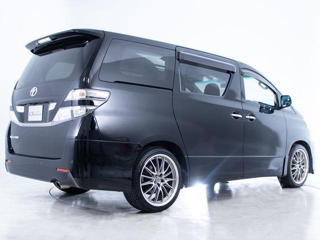 ヴェルファイア 2.4Z プラチナセレクションII タイプゴールド (禁煙車)(フロントリップ)(社外20インチアルミ)(黒革調シートカバー)純正HDDナビ/後席モニター/バックカメラ/両側自動ドア/パワーバックドア/クリアランスソナー/コンビハンドル/(19枚目)
