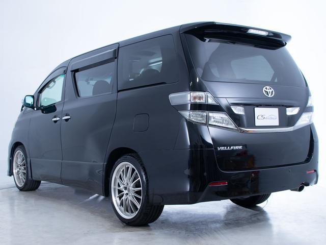 ヴェルファイア 2.4Z プラチナセレクションII タイプゴールド (禁煙車)(フロントリップ)(社外20インチアルミ)(黒革調シートカバー)純正HDDナビ/後席モニター/バックカメラ/両側自動ドア/パワーバックドア/クリアランスソナー/コンビハンドル/(21枚目)
