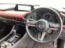MAZDA3ファストバック 1.8 XD バーガンディ セレクション ディーゼルターボ BOSEサウンドシステム 360°セーフティパッケージ レーンアシスト パーキングセンサー 誤発進抑制 LEDライト 1オーナー ミュージックプレイヤー接続可 レザーシート オートライト Pシート 中古車画像_2