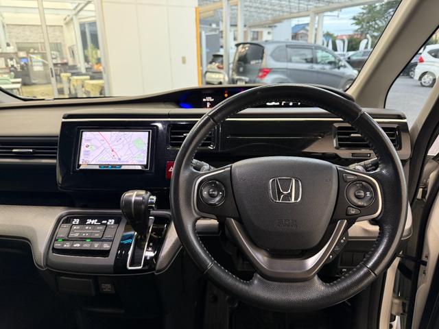 ステップワゴンスパーダ スパーダホンダセンシング　社外メモリーナビゲーション　フルセグＴＶ　Ｂｌｕｅｔｏｏｔｈ接続　バックカメラ　ＥＴＣ　ＬＥＤヘッドライト　両側電動スライドドア　盗難防止　助手席エアバッグ　ワンオーナ－　Ｗパワスラ　記録簿有　地デジ（7枚目）