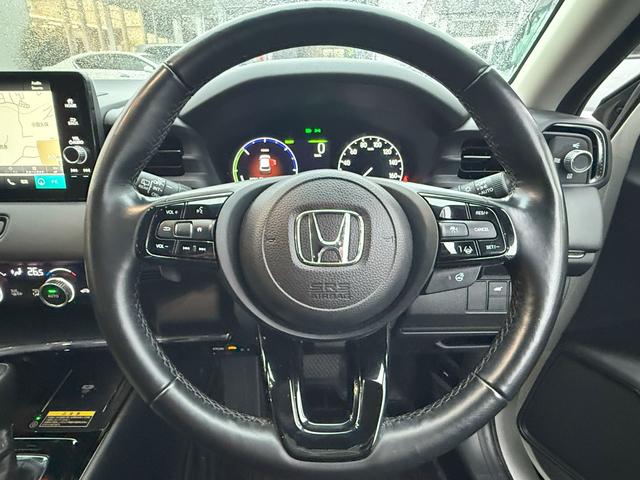 ヴェゼル ｅ：ＨＥＶＺ　純正メモリーナビゲーション　ＥＴＣ車載器　純正前後ドライブレコーダー　パワーテールゲート　ハンドルヒーター　パーキングセンサー　盗難防止装置　ドラレコ付き　Ｒカメラ　記録簿　フルセグテレビ　Ｐセンサー（6枚目）