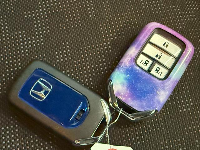 フリードハイブリッド ハイブリッド・クロスターホンダセンシング 純正メモリーナビゲーション バックカメラ ETC スマートキー LEDヘッドライト LEDフォグライト 前後ドライブレコーダー 純正アルミホイール 両側Pスライドドア USB DVD再生可能 ABS(19枚目)