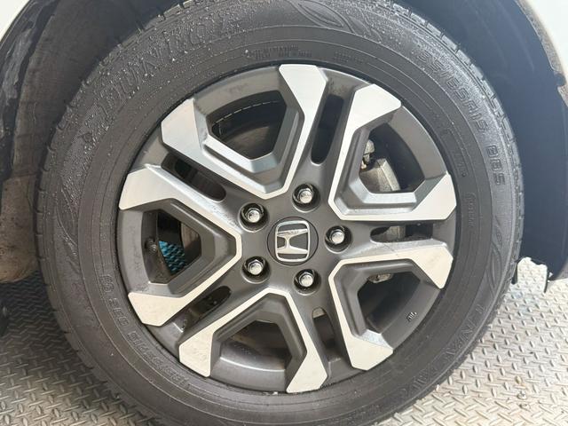 フリードハイブリッド ハイブリッド・クロスターホンダセンシング 純正メモリーナビゲーション バックカメラ ETC スマートキー LEDヘッドライト LEDフォグライト 前後ドライブレコーダー 純正アルミホイール 両側Pスライドドア USB DVD再生可能 ABS(20枚目)