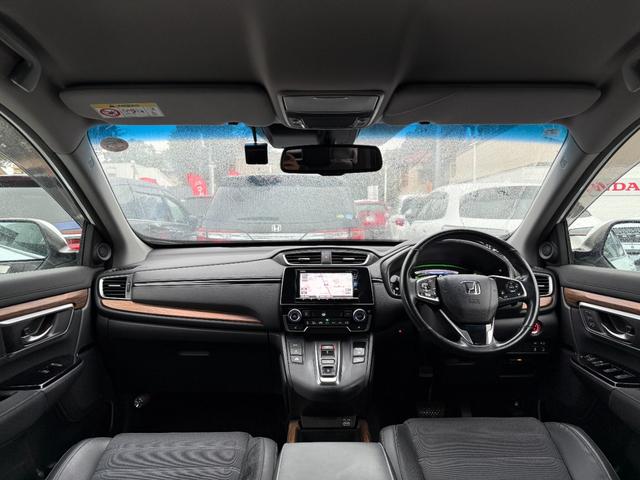 ＣＲ－Ｖハイブリッド ｅ：ＨＥＶＥＸ　ワンオーナー　純正メモリーナビゲーション　フルセグＴＶ　Ｂｌｕｅｔｏｏｔｈ接続　バックカメラ　ＥＴＣ　純正ドライブレコーダー　電動シート　ＬＥＤヘッドライト　ＤＶＤ再生　１オーナー　運転席パワーシート（5枚目）