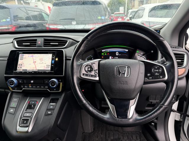 ＣＲ－Ｖハイブリッド ｅ：ＨＥＶＥＸ　ワンオーナー　純正メモリーナビゲーション　フルセグＴＶ　Ｂｌｕｅｔｏｏｔｈ接続　バックカメラ　ＥＴＣ　純正ドライブレコーダー　電動シート　ＬＥＤヘッドライト　ＤＶＤ再生　１オーナー　運転席パワーシート（6枚目）