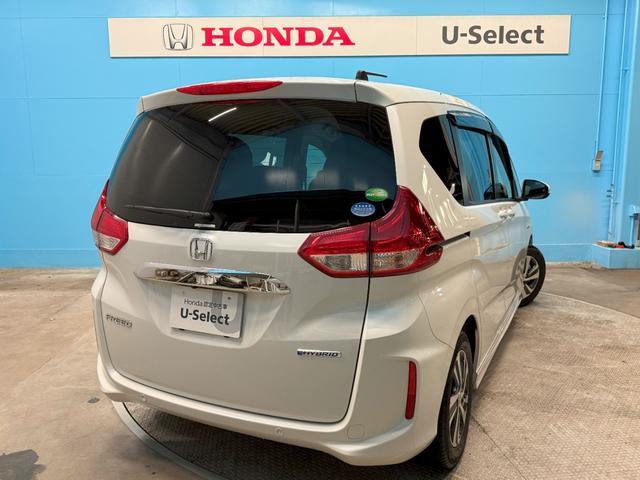 フリードハイブリッド ハイブリッド・Ｇホンダセンシング　Ｓパッケージ、Ｃパッケージ、純正メモリーナビ、ＥＴＣ車載器、アダプティブクルーズコントロール、純正フロントドライブレコーダー、バックカメラ、純正アルミホイール、　フロントカメラ　軽減ブレーキ　記録簿（2枚目）