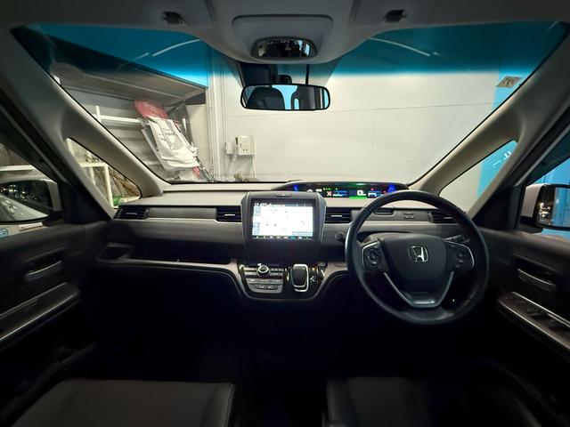 フリードハイブリッド ハイブリッド・Ｇホンダセンシング　Ｓパッケージ、Ｃパッケージ、純正メモリーナビ、ＥＴＣ車載器、アダプティブクルーズコントロール、純正フロントドライブレコーダー、バックカメラ、純正アルミホイール、　フロントカメラ　軽減ブレーキ　記録簿（6枚目）
